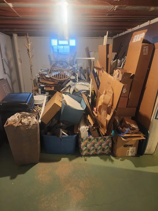 Roll-off dumpster container at job site for 8 Yard Dumpster Rental in Huguley